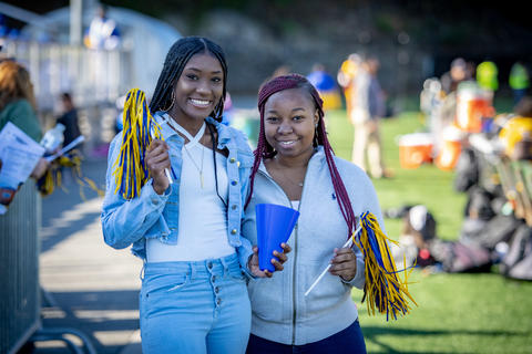 Two Monroe students at homecoming.